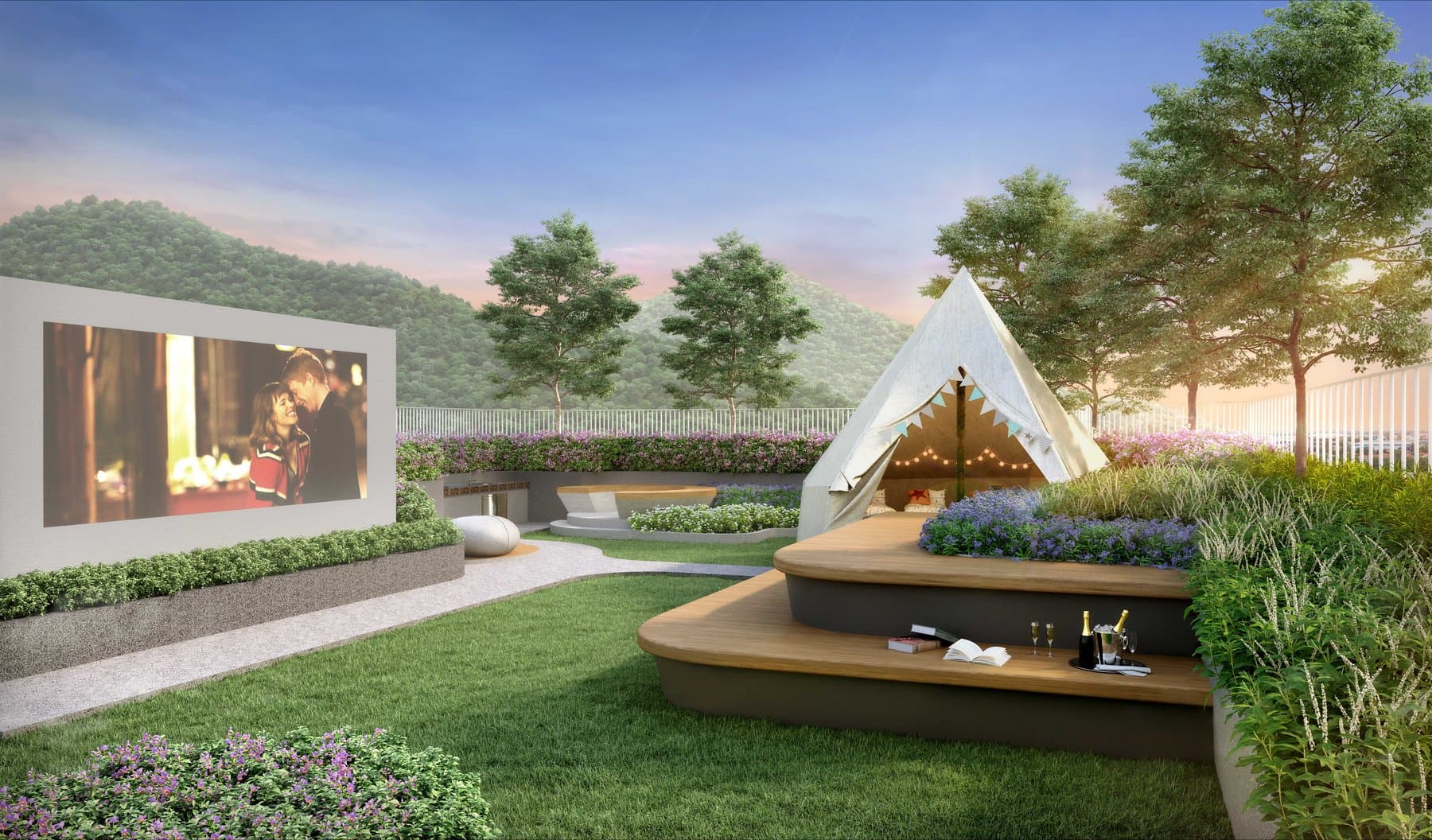 Landscaped lawn at Atmoz Serene Sriracha with a triangular timber pavilion and an outdoor projection screen set against the hillside (computer-generated render)