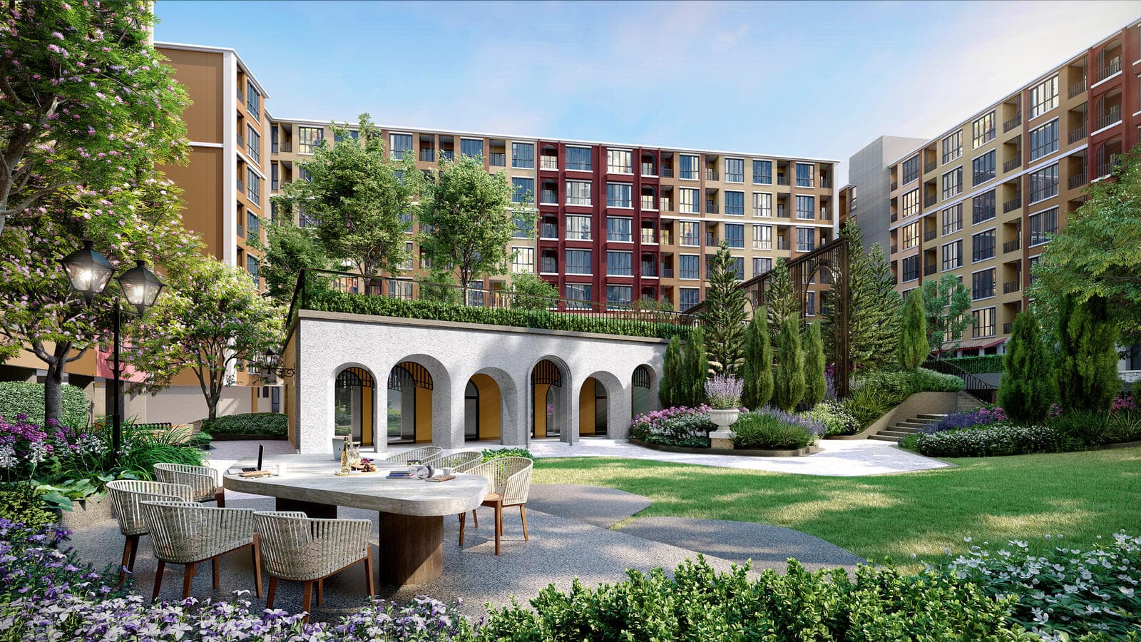 Garden courtyard with an outdoor dining table and arched pavilion, framed by the eight-storey Atmoz Portrait Srisamarn buildings (developer render)